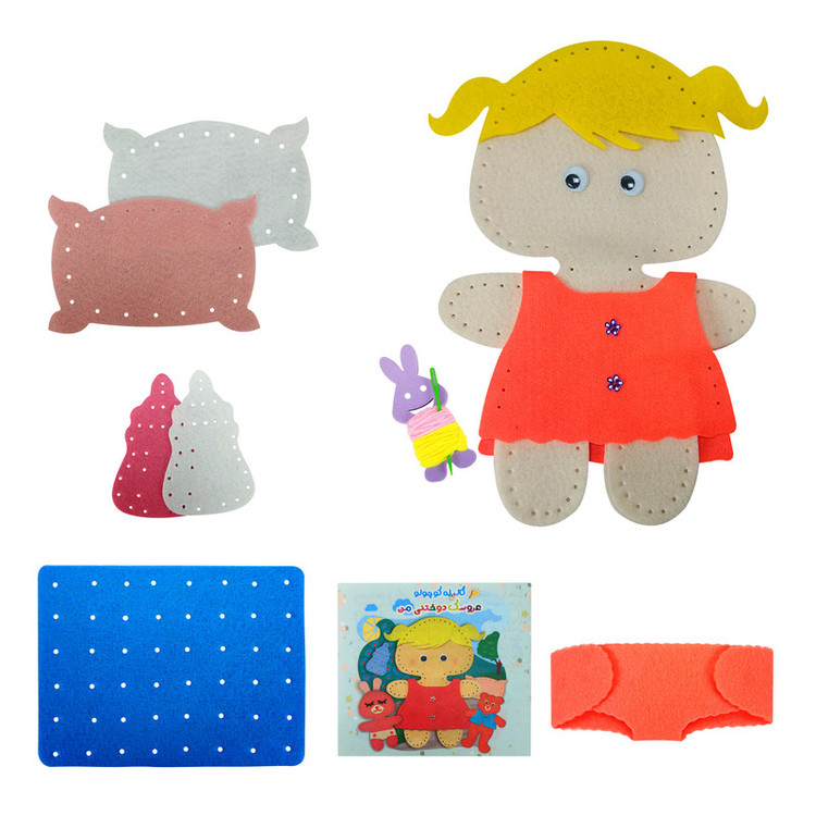 پک آموزشی شامل لباس، شیشه شیر، بالشت و پوشک نمدی