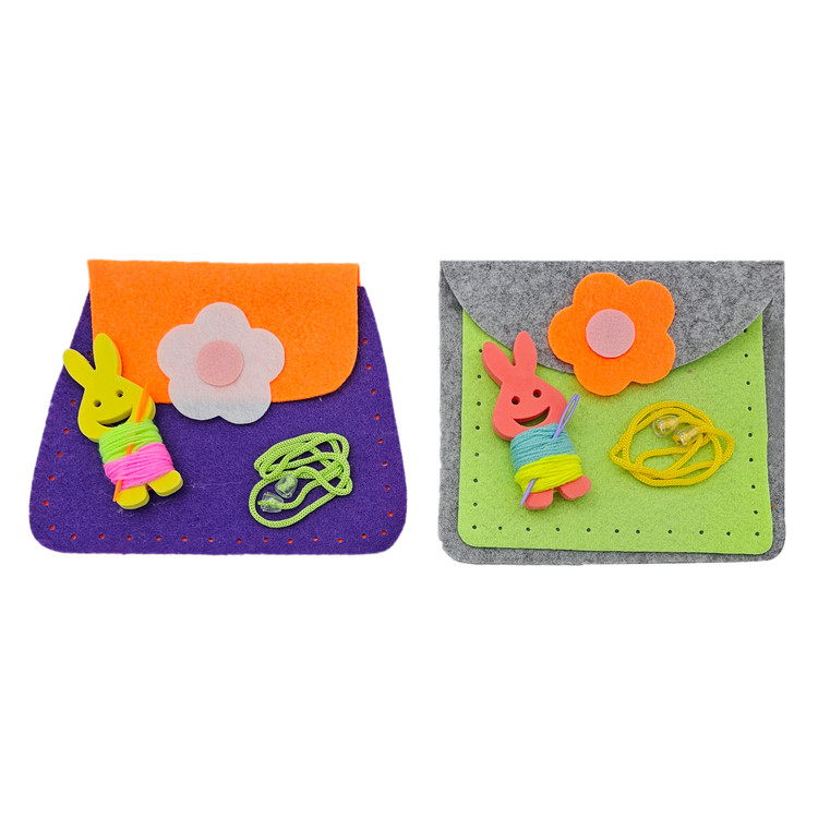 عالیت آموزشی کودک با پانچ و دوخت پارچهای